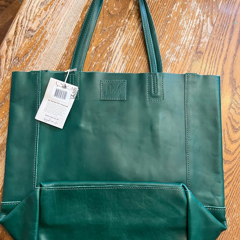 Brand New genuine leather Sseko bucket bag in oiled agave.